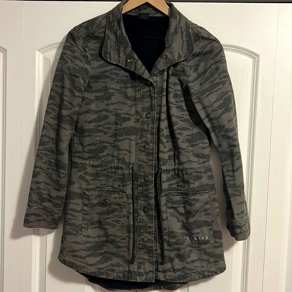 So cute! Oakley lined, drawstring jacket. XS